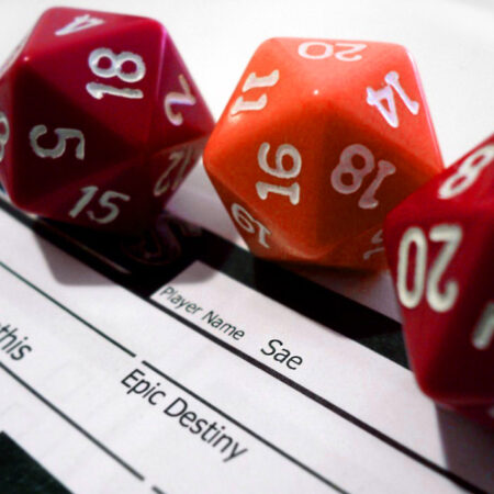 three dice on a character sheet
